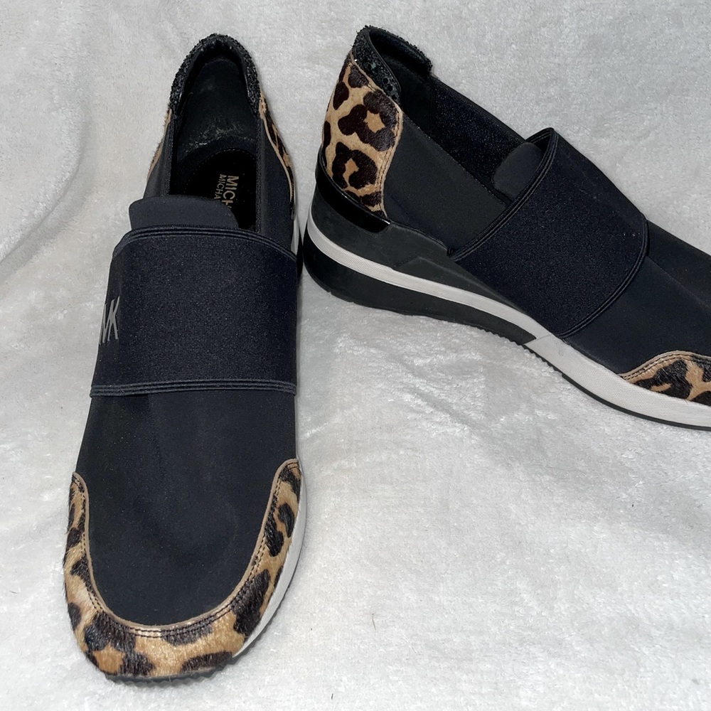 Michael Kors black and leopard wedge sneakers…ultimate style, ultimate comfort.